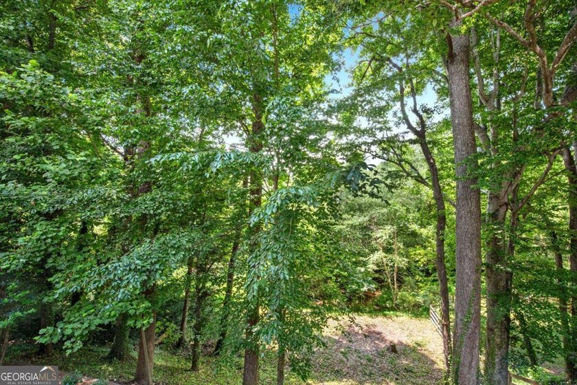 Nestled in the Highly Sought-After Active Swim/Tennis and Lake - photo 22