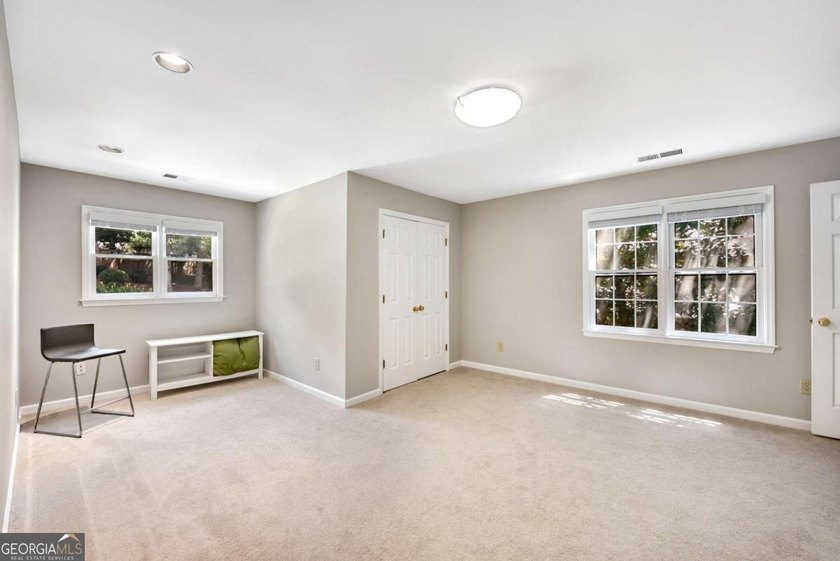 Nestled in the Highly Sought-After Active Swim/Tennis and Lake - photo 32
