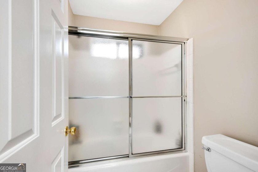 Nestled in the Highly Sought-After Active Swim/Tennis and Lake - photo 36