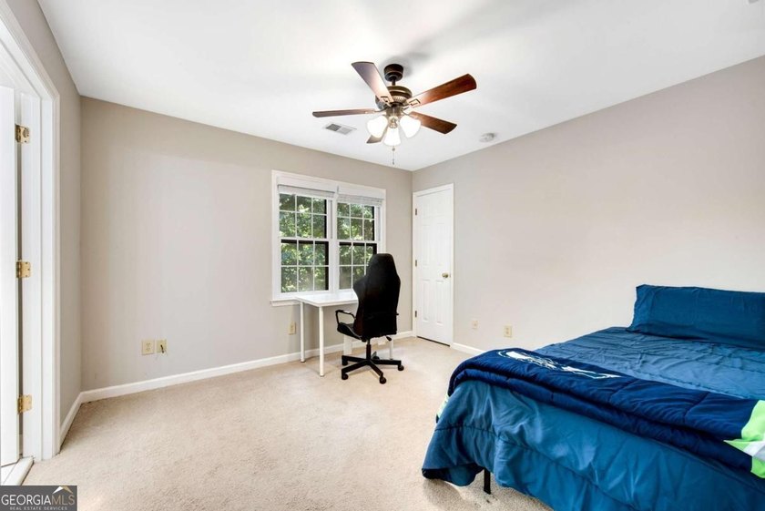 Nestled in the Highly Sought-After Active Swim/Tennis and Lake - photo 37
