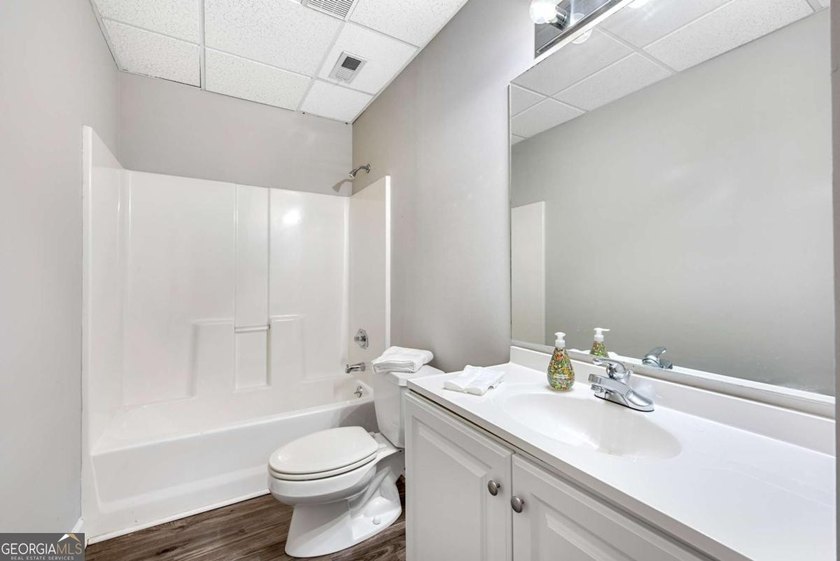 Nestled in the Highly Sought-After Active Swim/Tennis and Lake - photo 44
