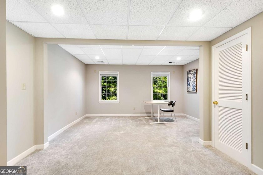 Nestled in the Highly Sought-After Active Swim/Tennis and Lake - photo 49