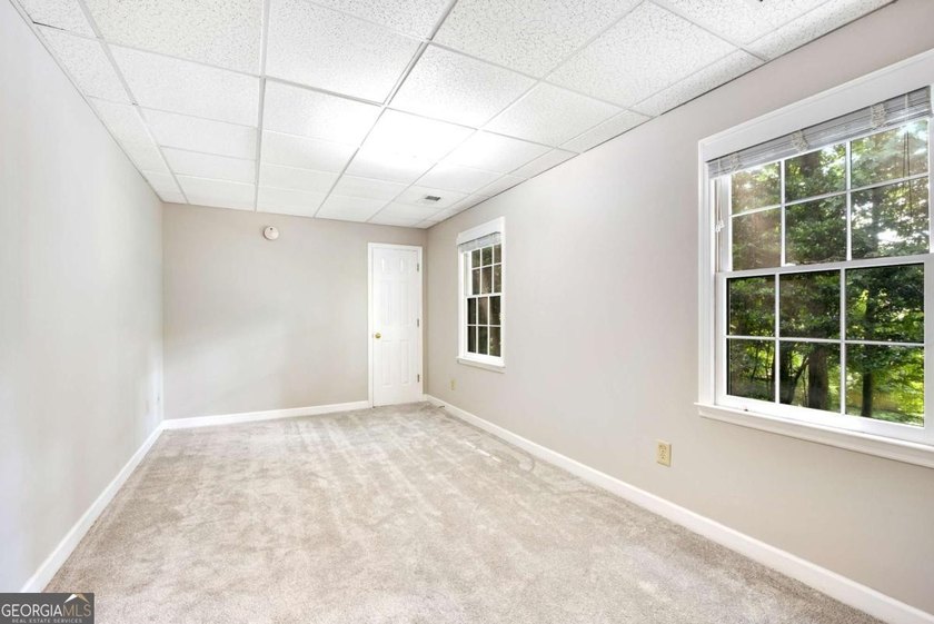 Nestled in the Highly Sought-After Active Swim/Tennis and Lake - photo 50