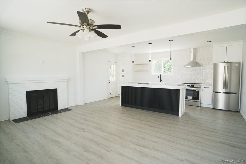 Discover the charm and comfort of this beautifully updated - photo 2