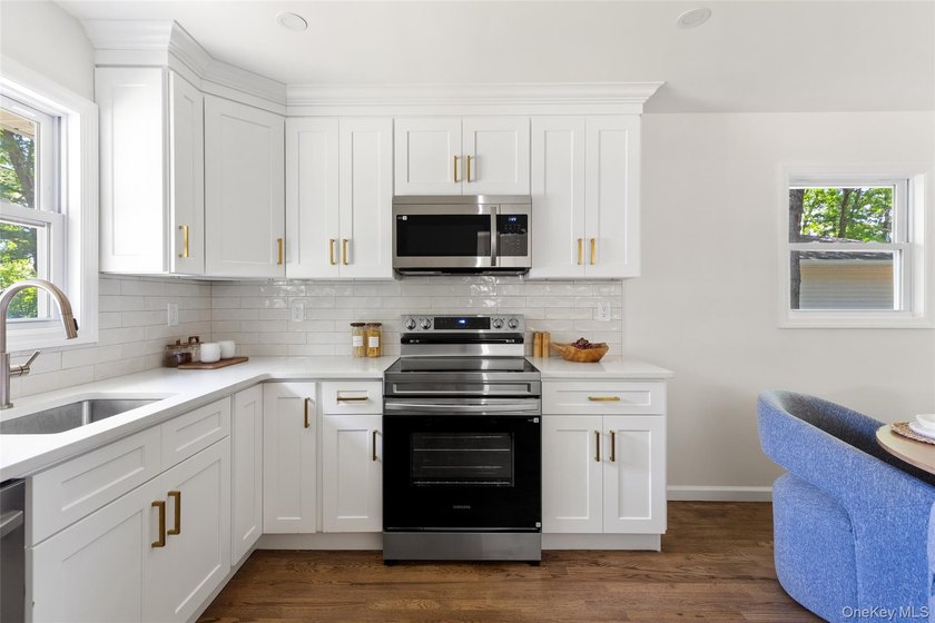 Beautifully renovated 3 bedroom, 1 bath home taken down to the - photo 11