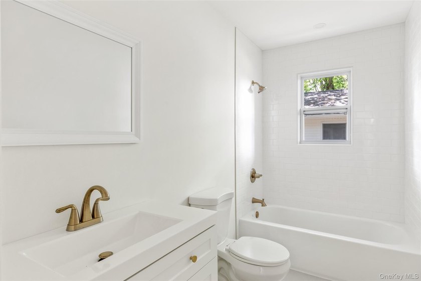 Beautifully renovated 3 bedroom, 1 bath home taken down to the - photo 13