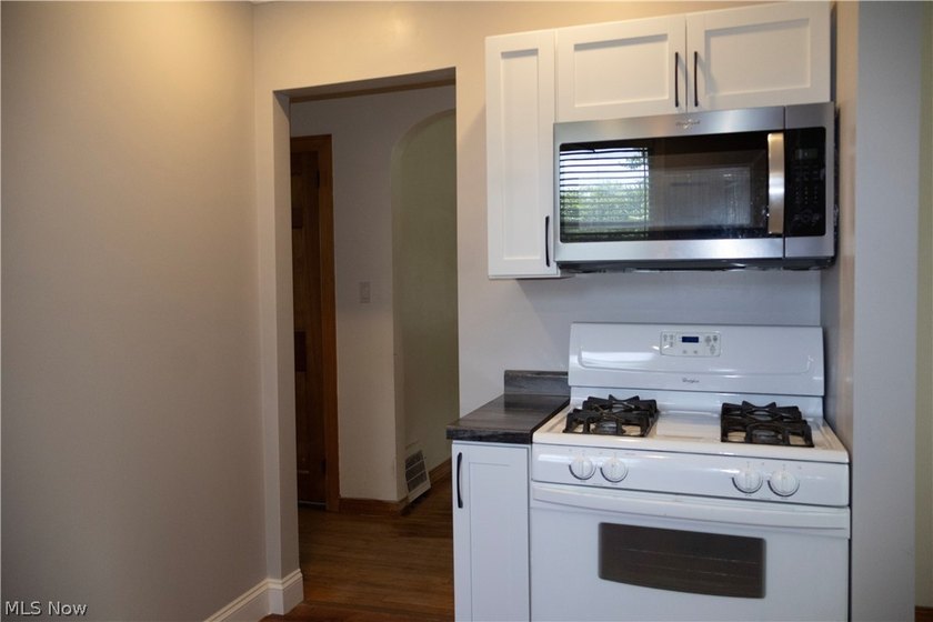 2nd floor unit features updated kitchen with beautiful wood - photo 7