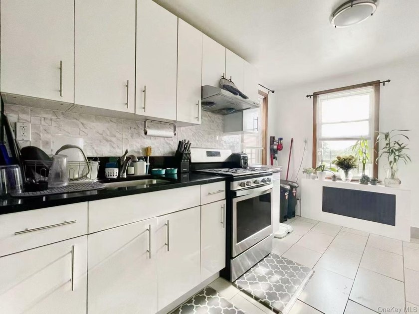 Welcome to this well-maintained legal 2-family home located in - photo 6