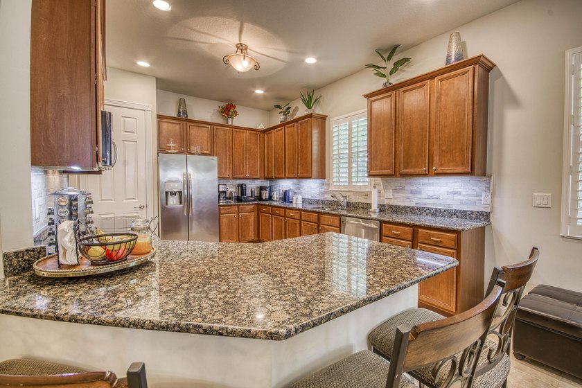 Rarely available single-level villa in Mallory Creek, offering a - photo 9