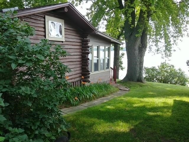 1930's original 3 season log cabin situated on 50' of prime Fox - photo 3