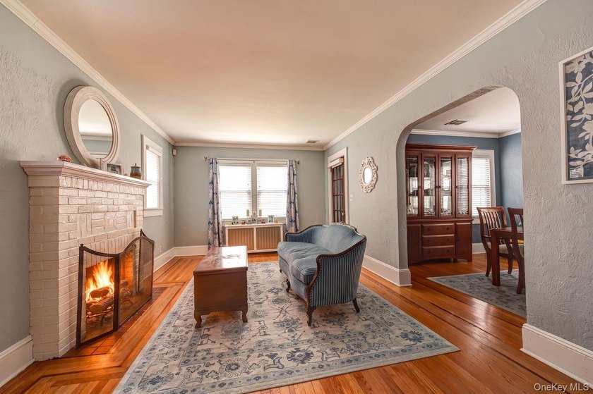 Oozing with charm this meticulously maintained brick Tudor is a - photo 3