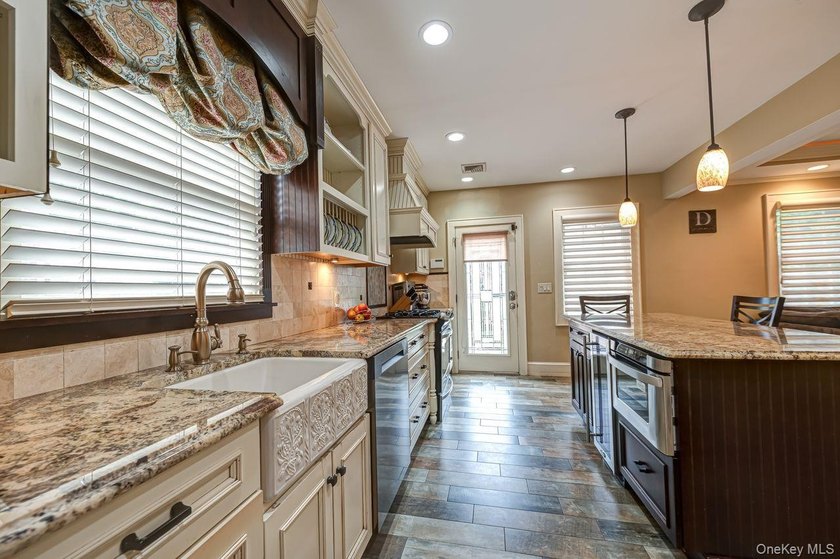 Oozing with charm this meticulously maintained brick Tudor is a - photo 6