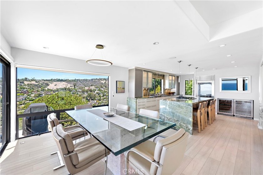 Welcome to a one-of-a-kind Laguna Beach retreat where style - photo 13
