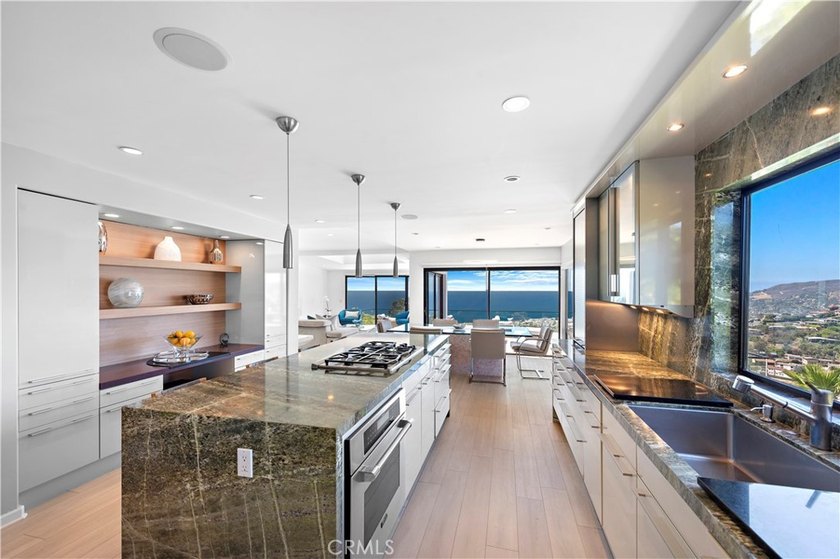 Welcome to a one-of-a-kind Laguna Beach retreat where style - photo 17