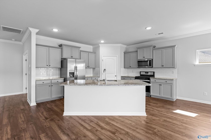 Welcome home this beautifully crafted 4 bedroom, 2.5 bath home - photo 8