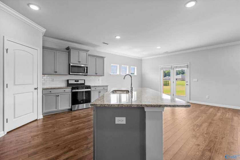 Welcome home this beautifully crafted 4 bedroom, 2.5 bath home - photo 9