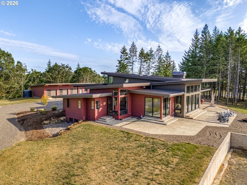 Spectacular modern masterpiece on 124.5 acres. This 2023-built - photo 4