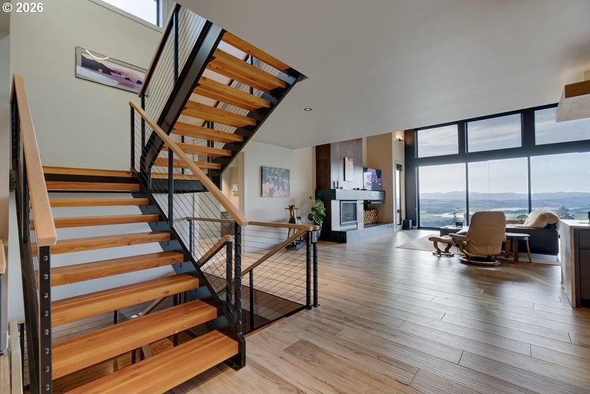 Spectacular modern masterpiece on 124.5 acres. This 2023-built - photo 8