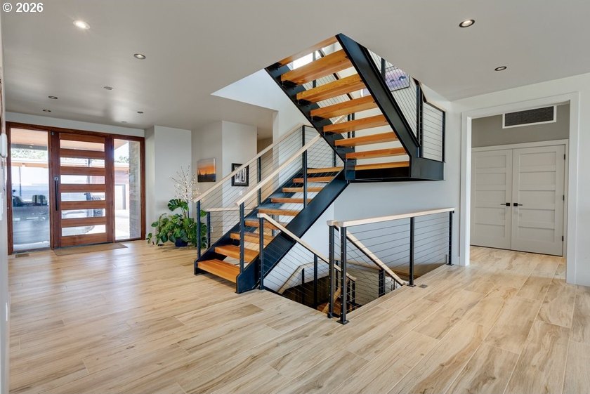 Spectacular modern masterpiece on 124.5 acres. This 2023-built - photo 9