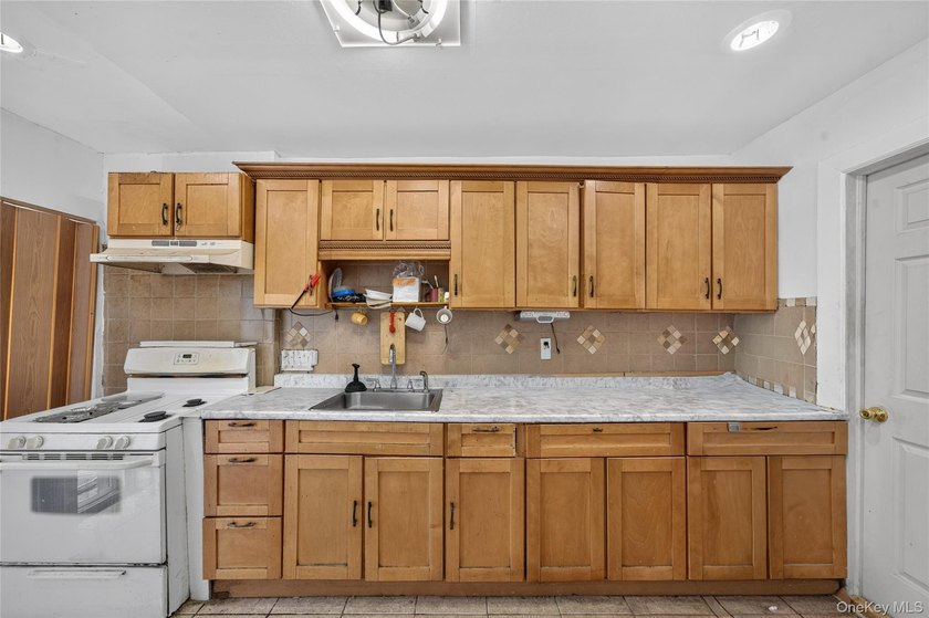 Solid brick home offering endless potential! Features include a - photo 8