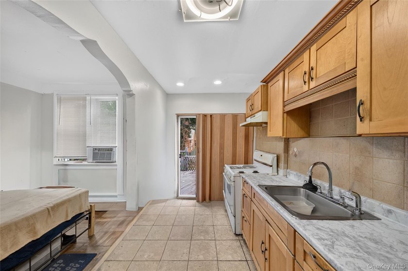 Solid brick home offering endless potential! Features include a - photo 10