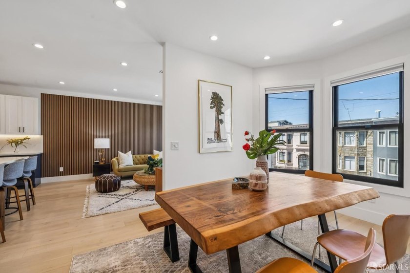 Thoughtfully renovated in 2023, this exceptional bi-level upper - photo 10