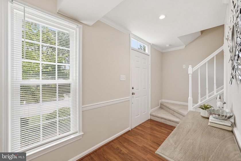 Welcome home to this spacious three-level single-family home - photo 2