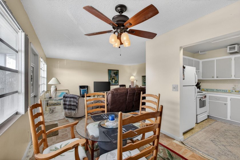 Serene lake views from the balcony highlight this 2/2 floor plan - photo 3
