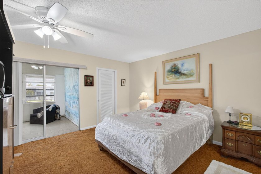 Serene lake views from the balcony highlight this 2/2 floor plan - photo 4