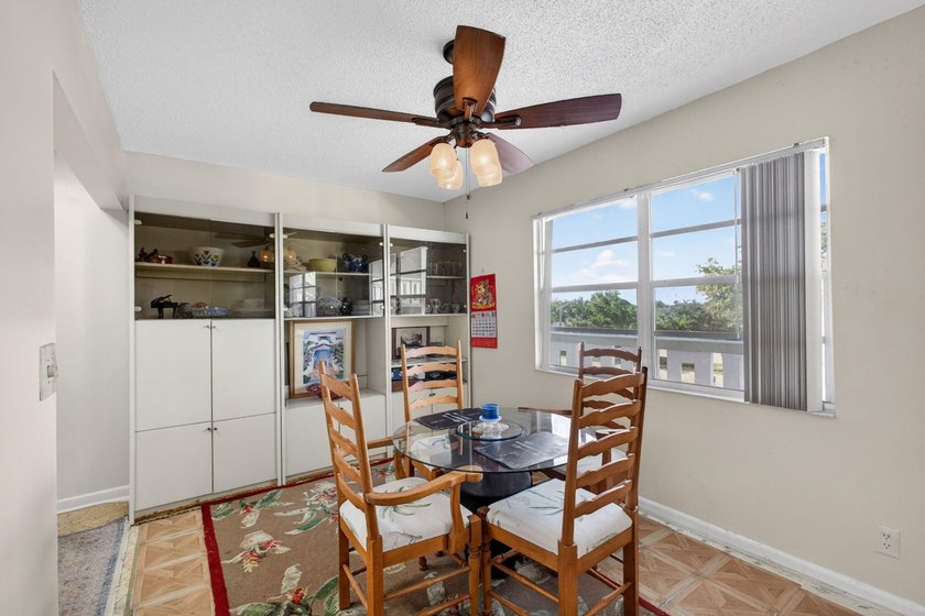 Serene lake views from the balcony highlight this 2/2 floor plan - photo 9