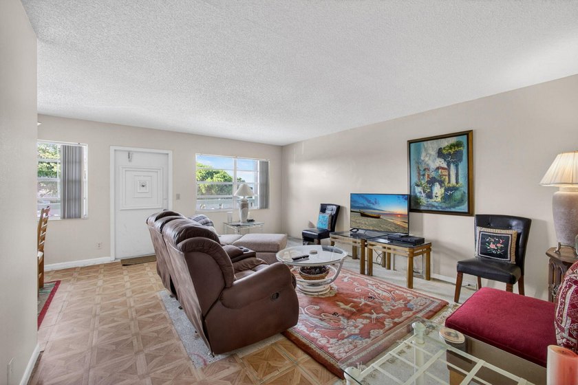 Serene lake views from the balcony highlight this 2/2 floor plan - photo 10