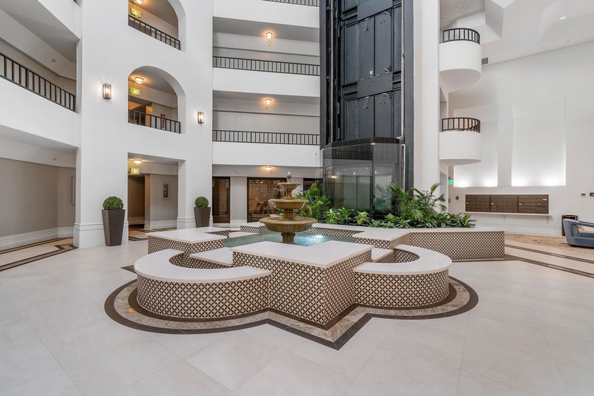 Welcome to the exclusive waterfront community of Mizner Court in - photo 4