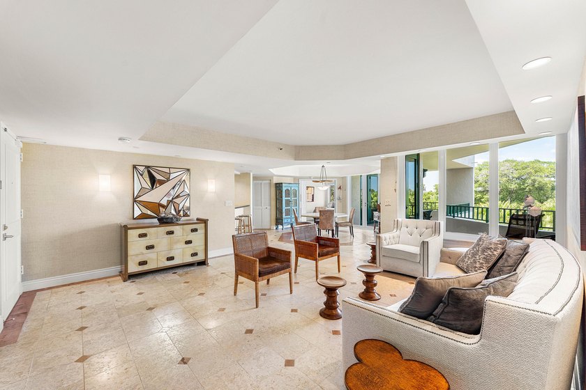 Welcome to the exclusive waterfront community of Mizner Court in - photo 6
