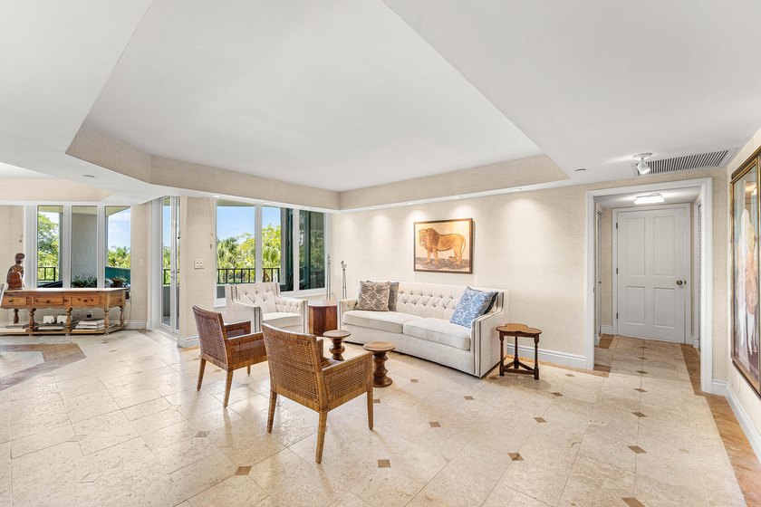 Welcome to the exclusive waterfront community of Mizner Court in - photo 7