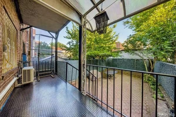 Rare opportunity to own a legal two-family brick home in the - photo 3