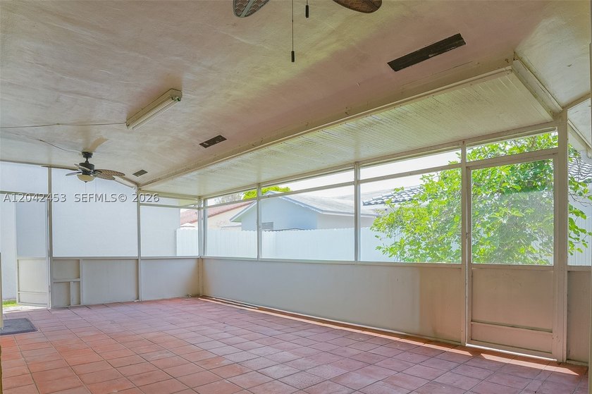 This charming 1988-built residence offers three bedrooms and two - photo 15