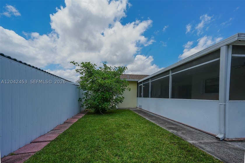This charming 1988-built residence offers three bedrooms and two - photo 16