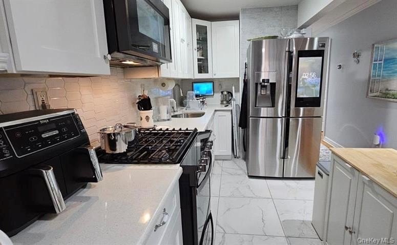 Welcome to **175 Beach 29th Street** - A Turnkey Legal Duplex in - photo 5