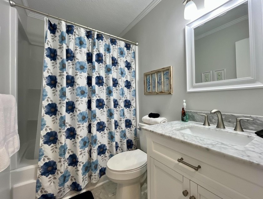Wake up to ocean views in this beautifully updated 2BR/2BA condo - photo 16