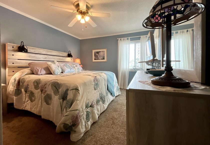 Wake up to ocean views in this beautifully updated 2BR/2BA condo - photo 21