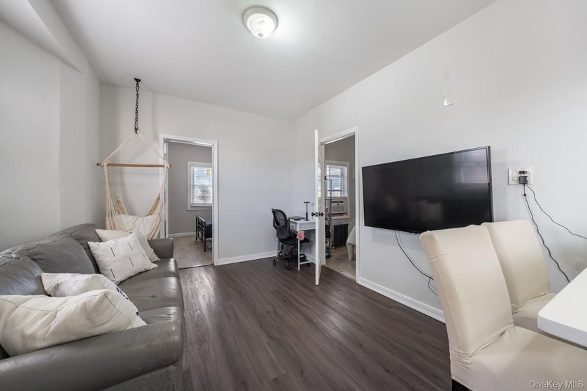 Welcome to this unique three-family home, a strong income - photo 19
