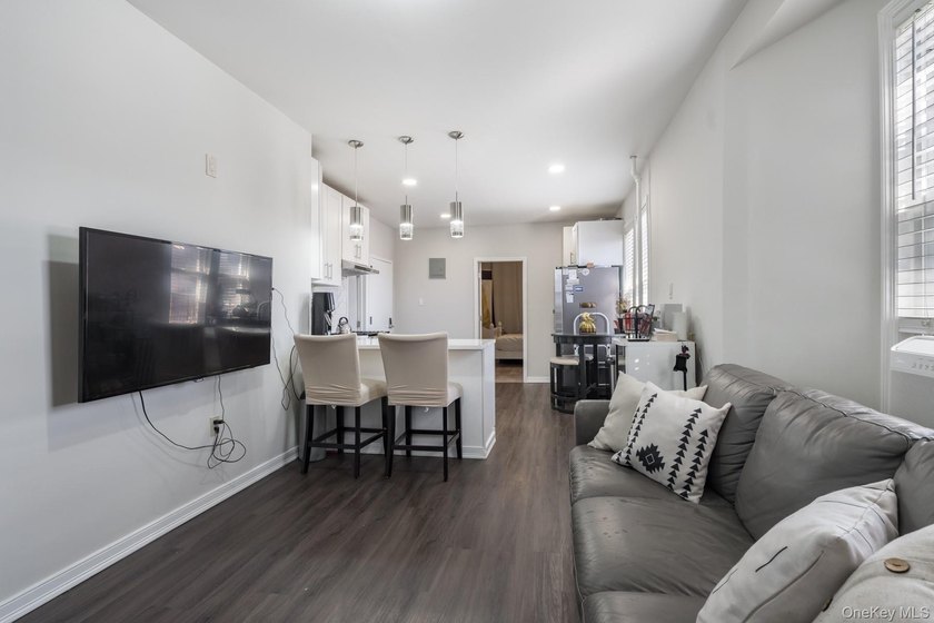 Welcome to this unique three-family home, a strong income - photo 21