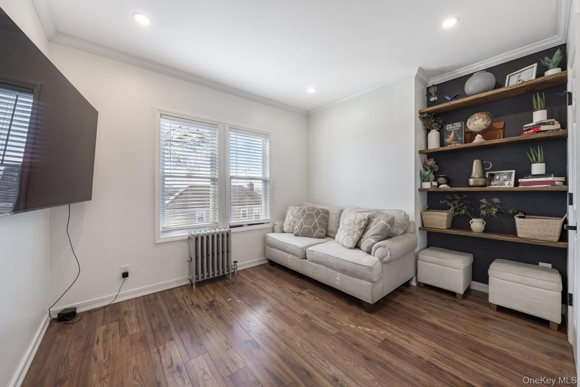 Welcome to this unique three-family home, a strong income - photo 30