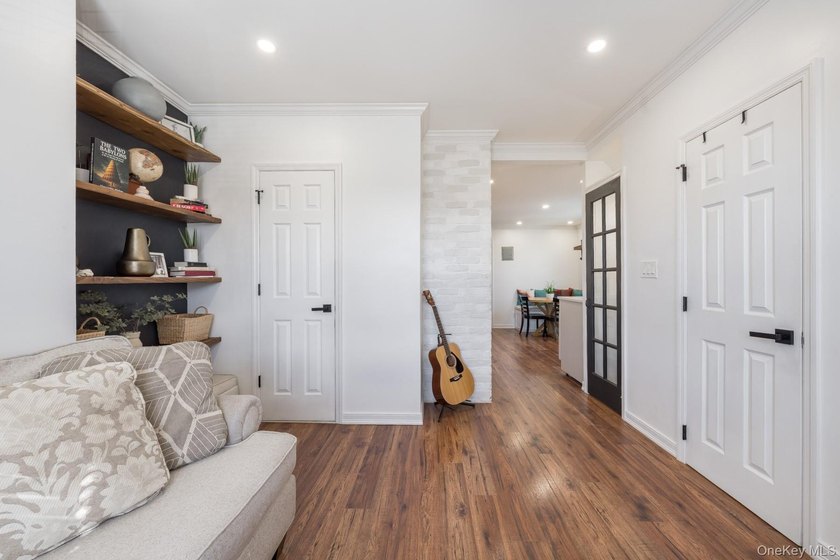 Welcome to this unique three-family home, a strong income - photo 31