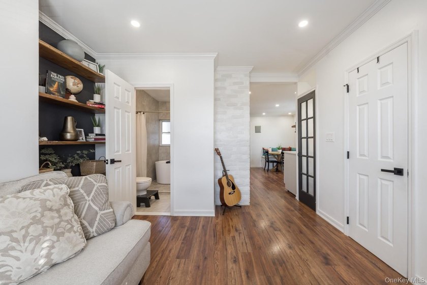 Welcome to this unique three-family home, a strong income - photo 32