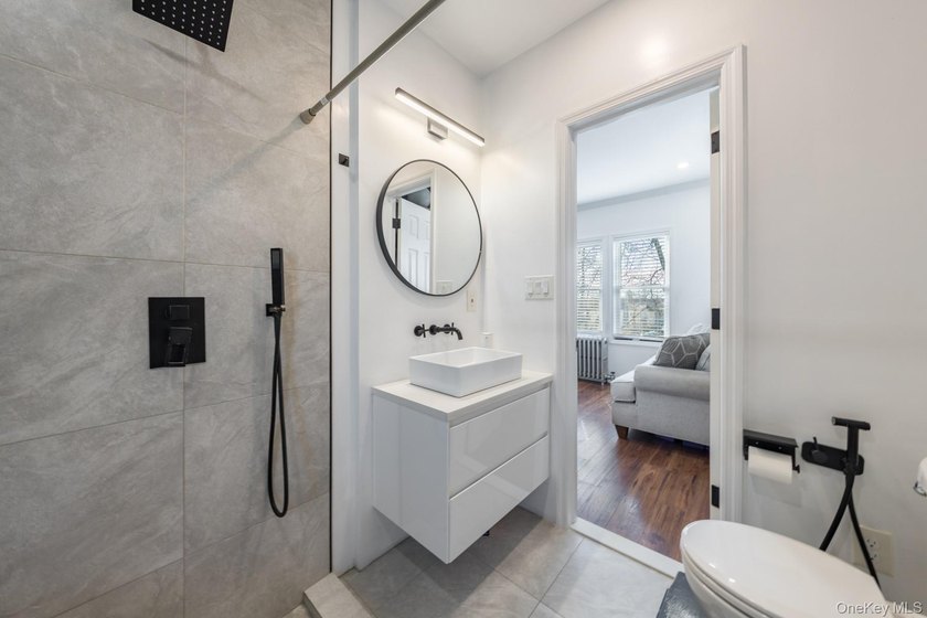 Welcome to this unique three-family home, a strong income - photo 34