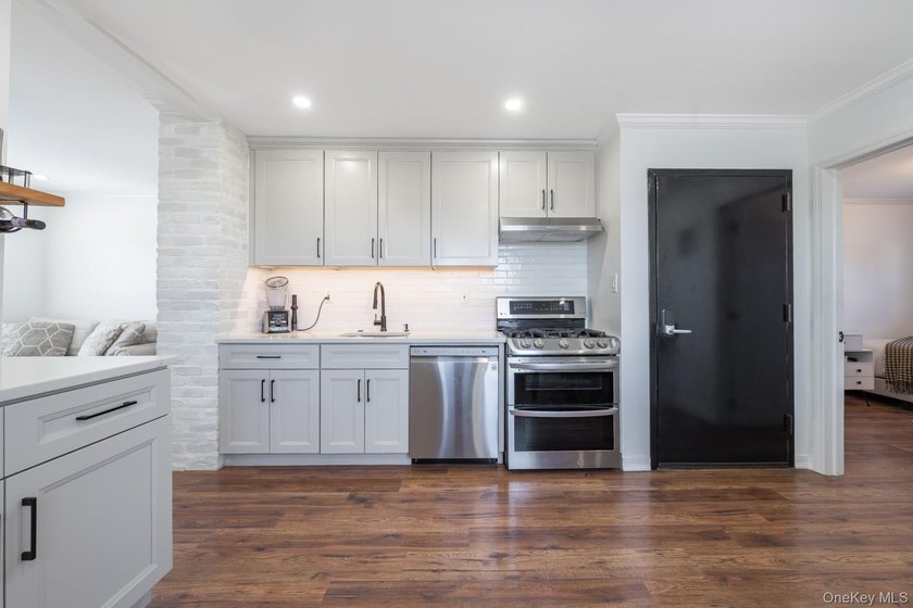 Welcome to this unique three-family home, a strong income - photo 37