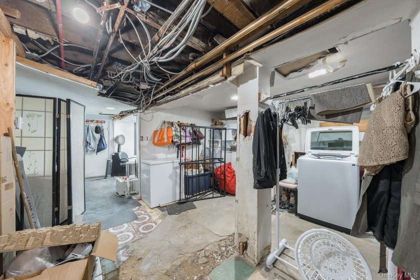 Welcome to this unique three-family home, a strong income - photo 42