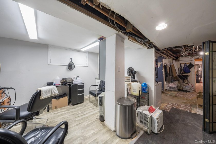 Welcome to this unique three-family home, a strong income - photo 43
