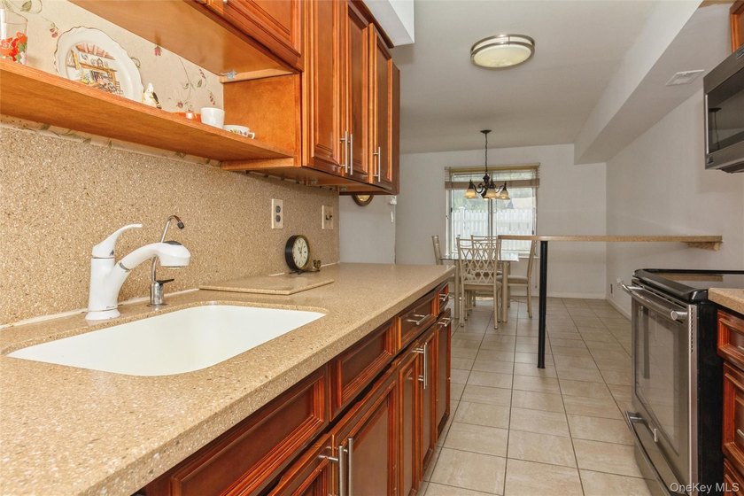Welcome to 51 Alhambra Dr. Enjoy the open dining area off the - photo 8